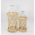 large ratten wrapped clear glass bottles with handle
